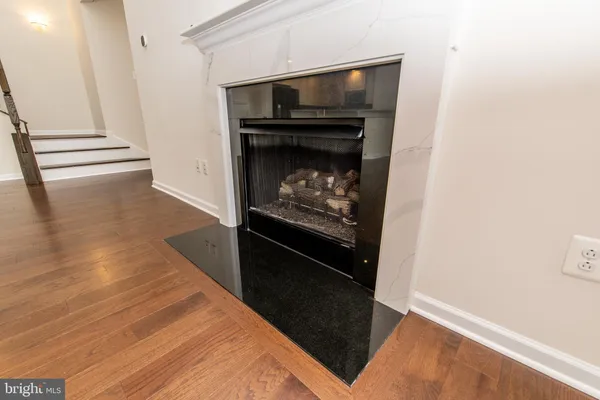 a living room with a fireplace