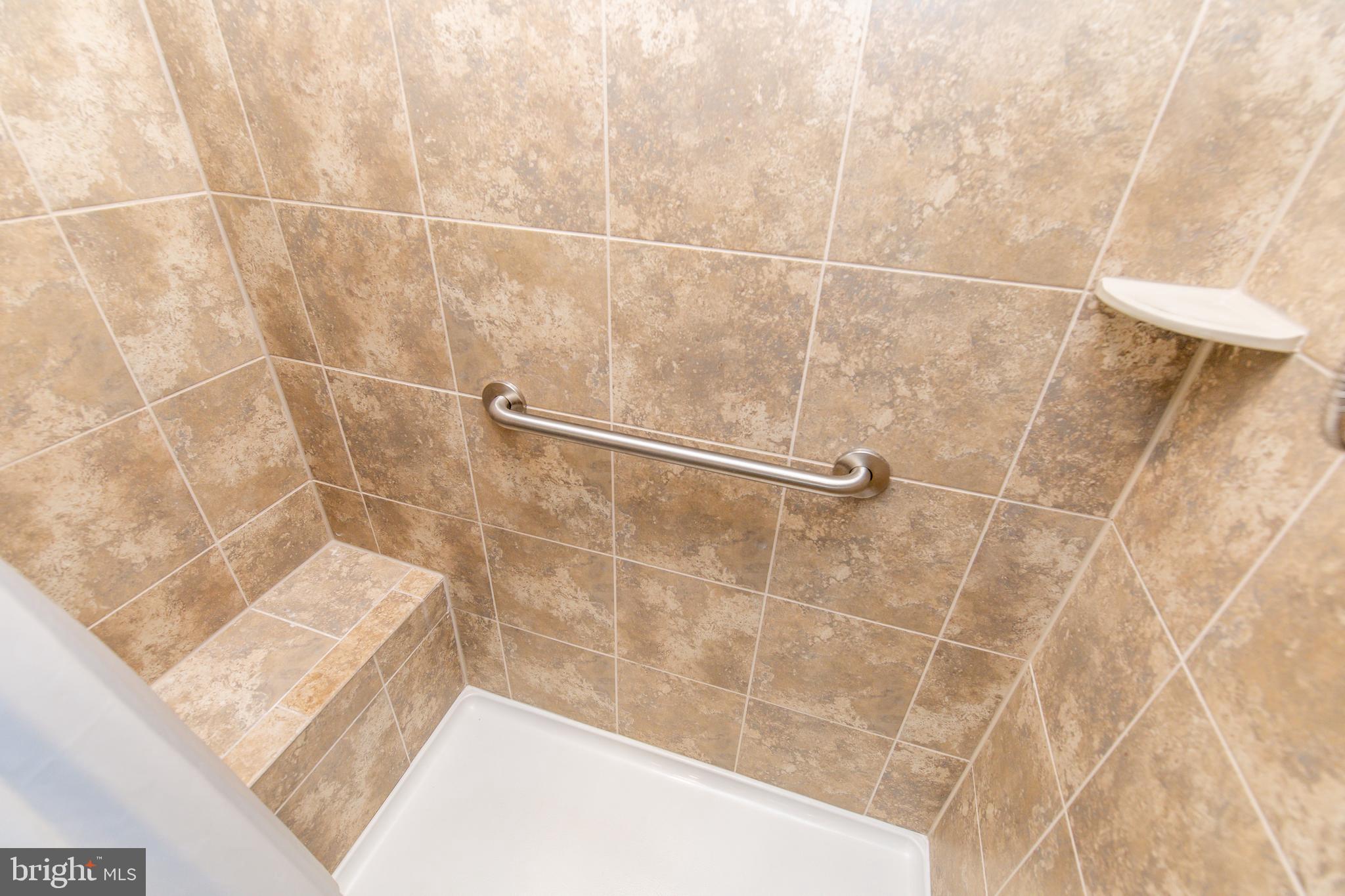 4861 Finnical Way, Unit 401 Frederick, MD 21703 - Photo 35 of 54 a bathroom with a shower