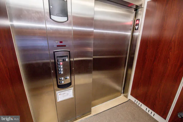 a front view of a building with street view