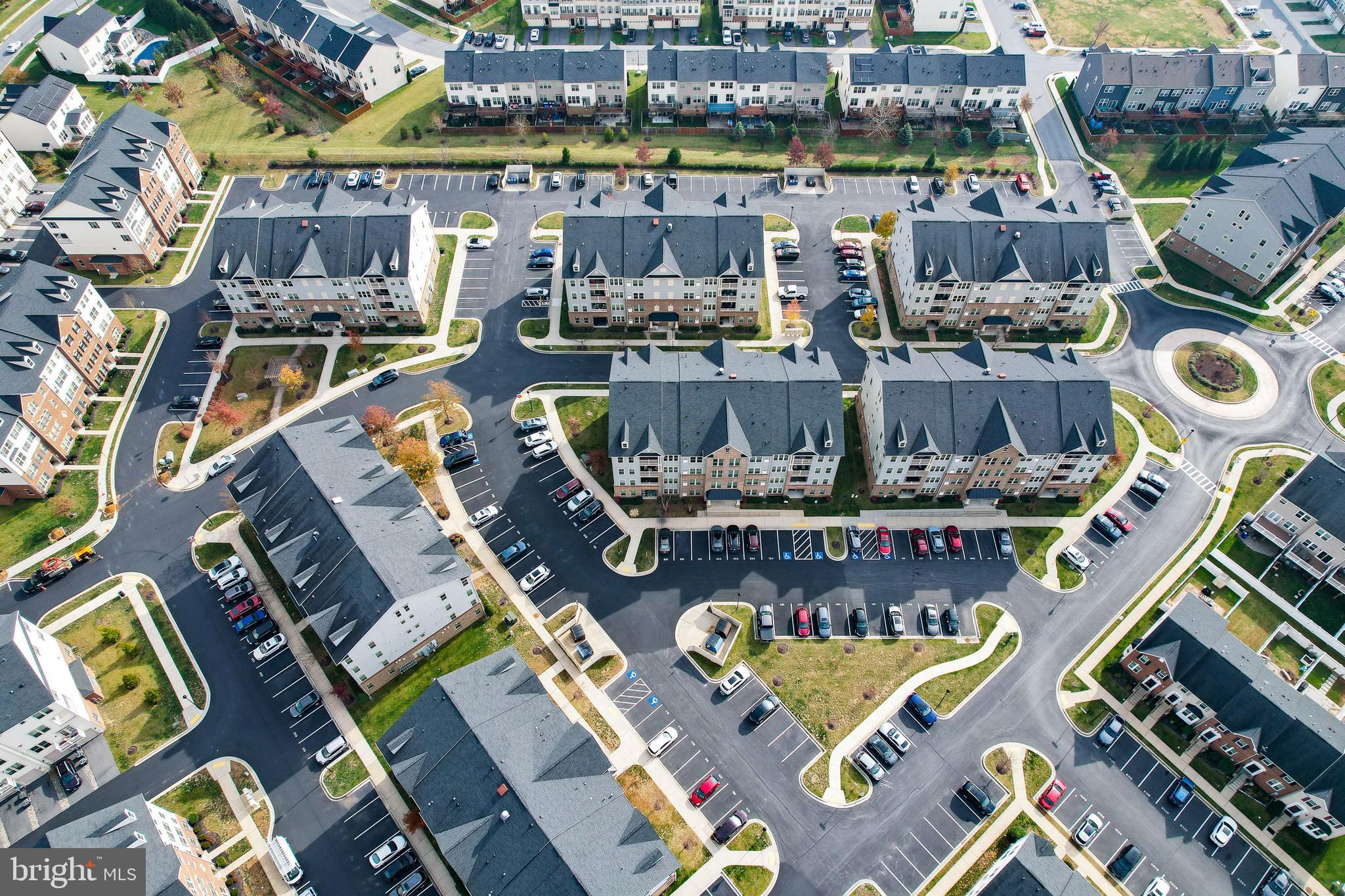 4861 Finnical Way, Unit 401 Frederick, MD 21703 - Photo 51 of 53 a view of swimming pool with outdoor seating
