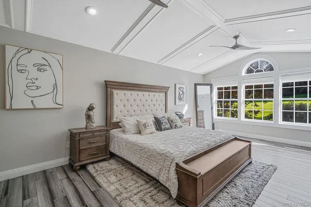 a view of a house with backyard sitting area and garden