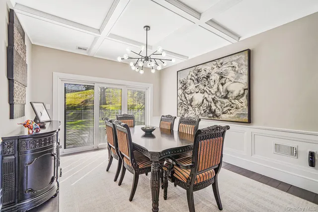 a kitchen with stainless steel appliances kitchen island granite countertop a sink and cabinets