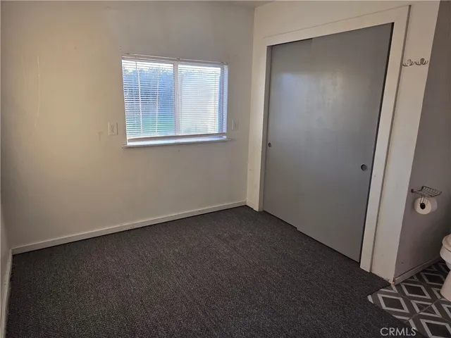 an empty room with closet