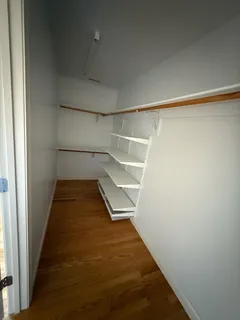 a view of entryway with wooden floor