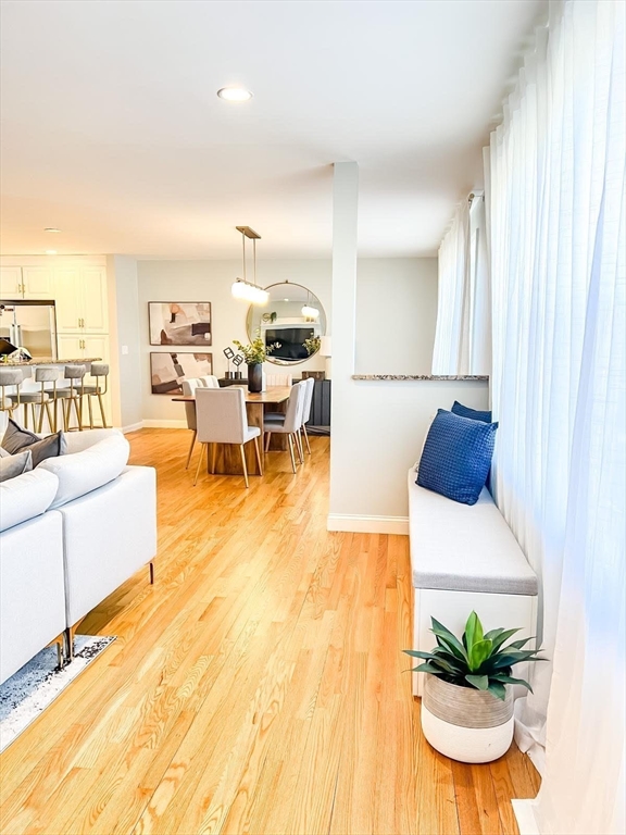 15 Spencer Street Methuen, MA 01844 - Photo 6 of 25 a living room with furniture and a potted plant