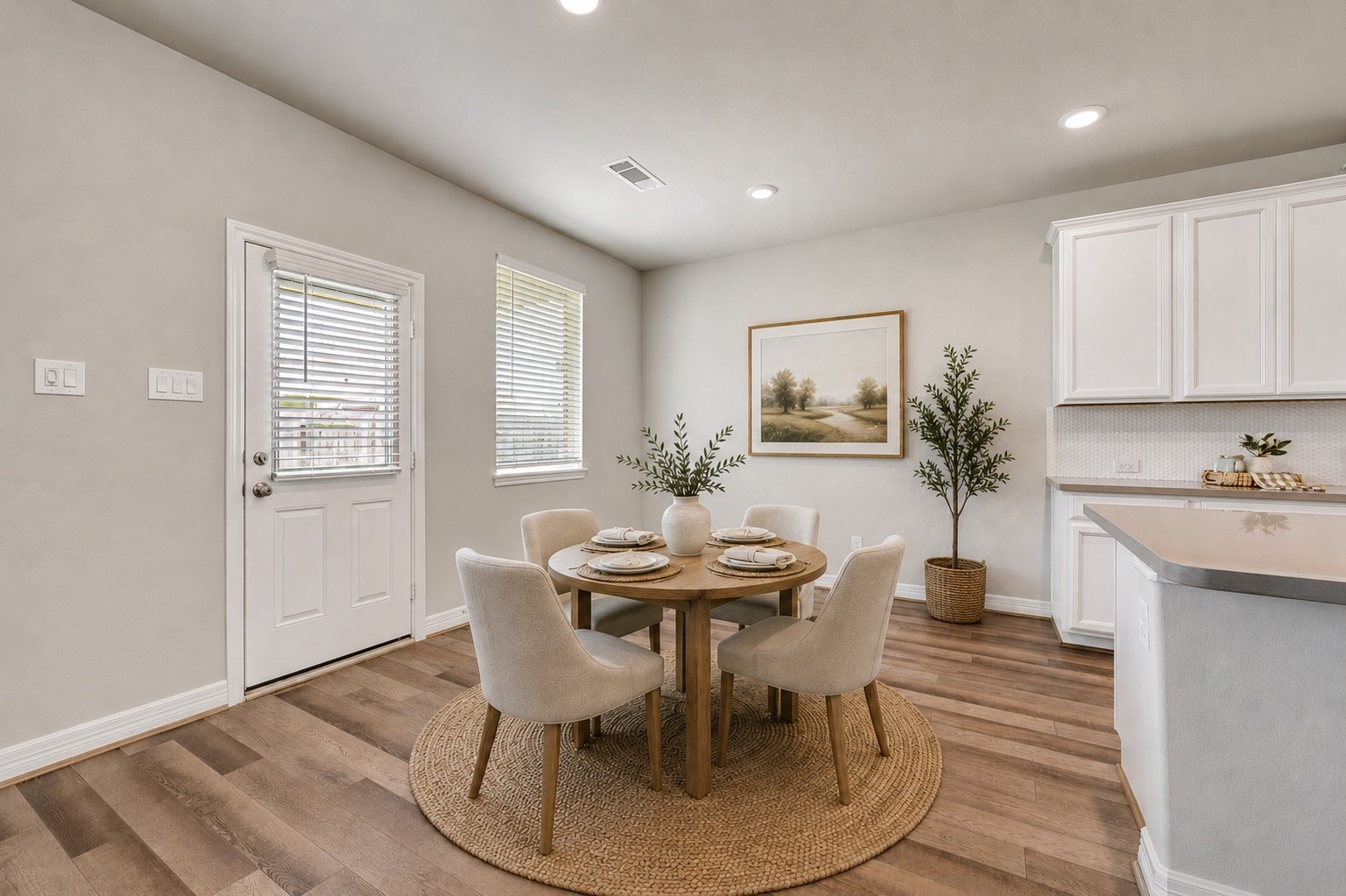 13420 Shellbark Way La Marque, TX 77568 - Photo 11 of 31 The sunny breakfast area will accommodate an extended table and chairs. Virtually staged.