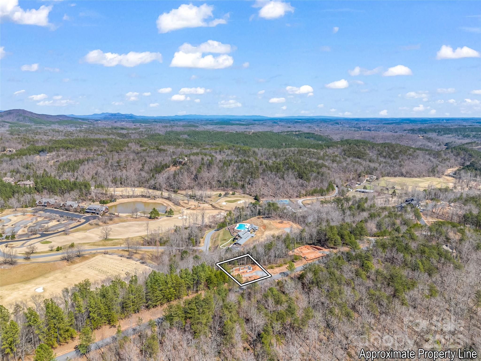 2015 Deep Gap Farm Road East Mill Spring, NC 28756 - Photo 19 of 36 a view of a yard with an outdoor space