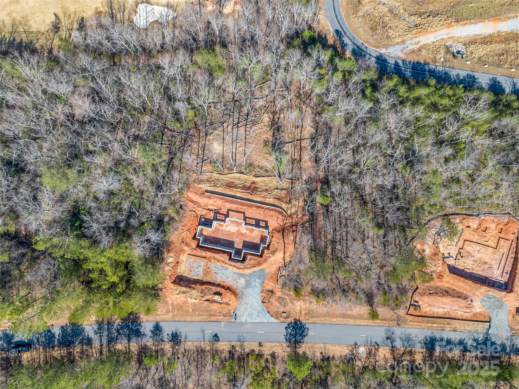 2015 Deep Gap Farm Road East Mill Spring, NC 28756 - Photo 10 of 36 an aerial view of a house with garden space and street view