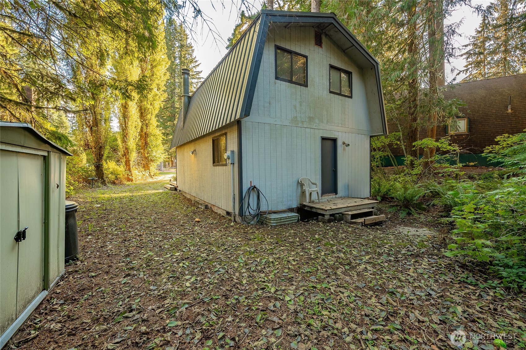 7018 Olympus Way Glacier, WA 98244 - Photo 27 of 35 a front view of a house with a yard