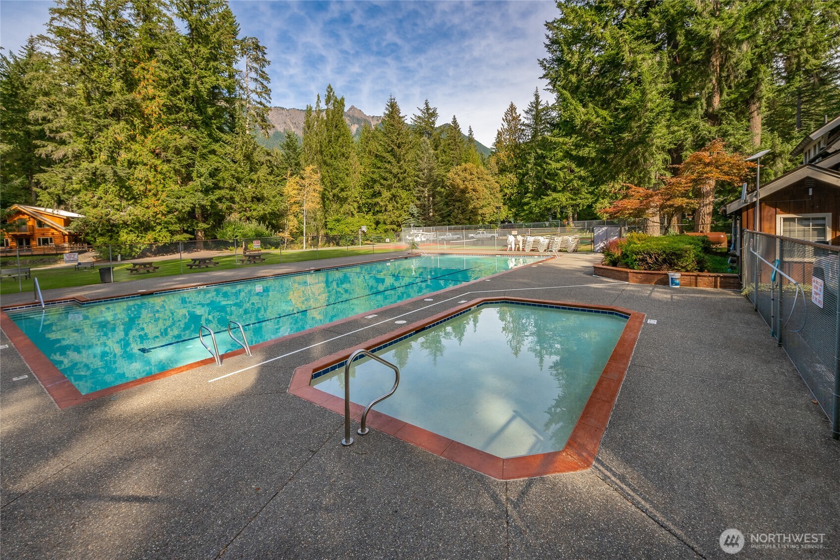 7018 Olympus Way Glacier, WA 98244 - Photo 28 of 35 a view of swimming pool with a patio