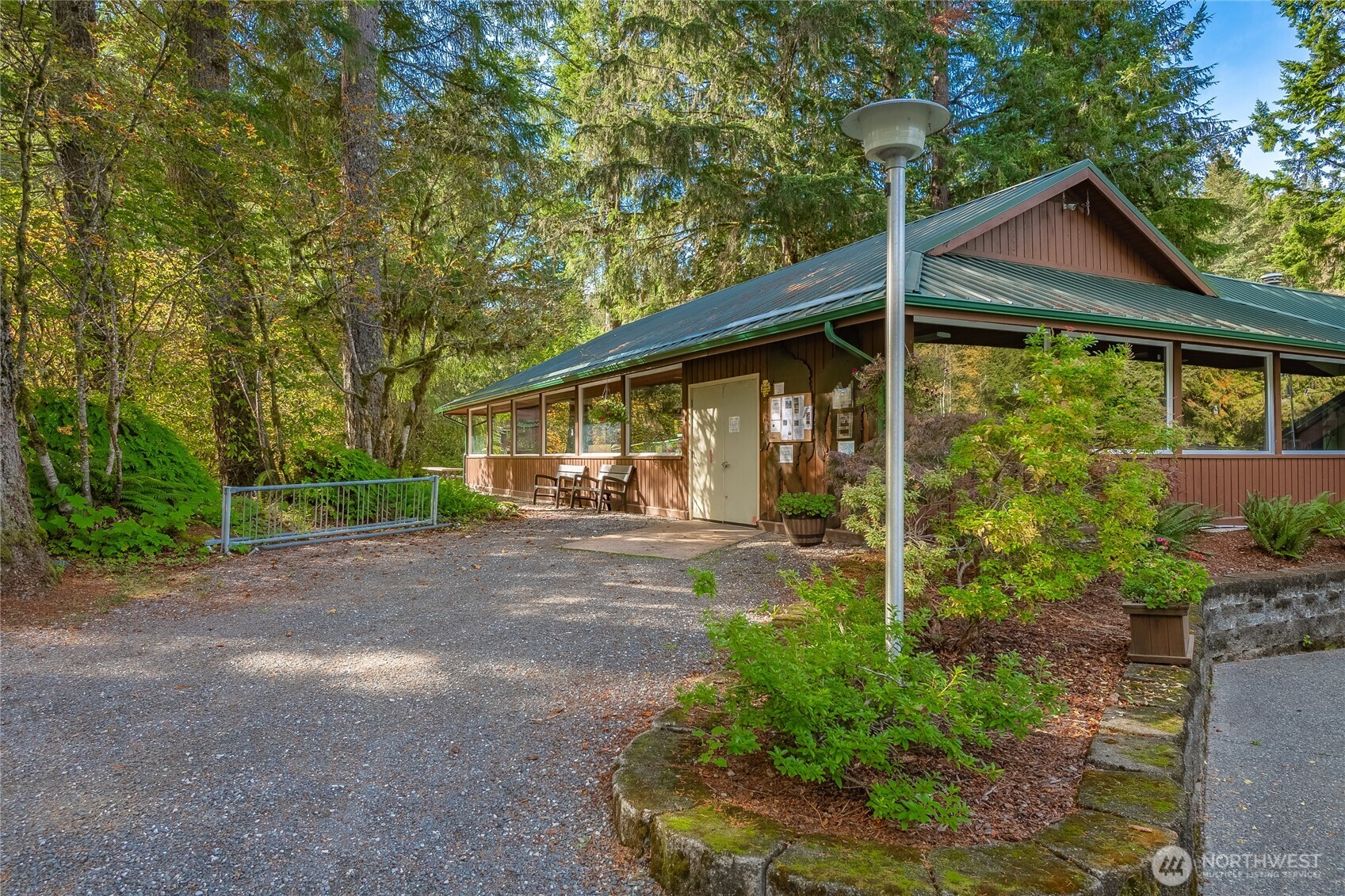7018 Olympus Way Glacier, WA 98244 - Photo 30 of 35 a front view of a house with garden