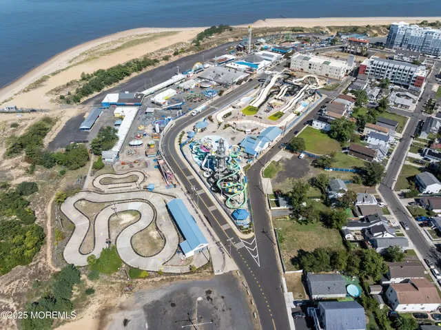 a view of a lake with a yard