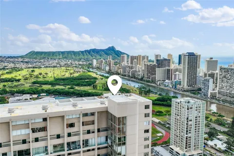 a view of a city with tall buildings