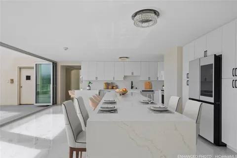 a view of a living room and dining room