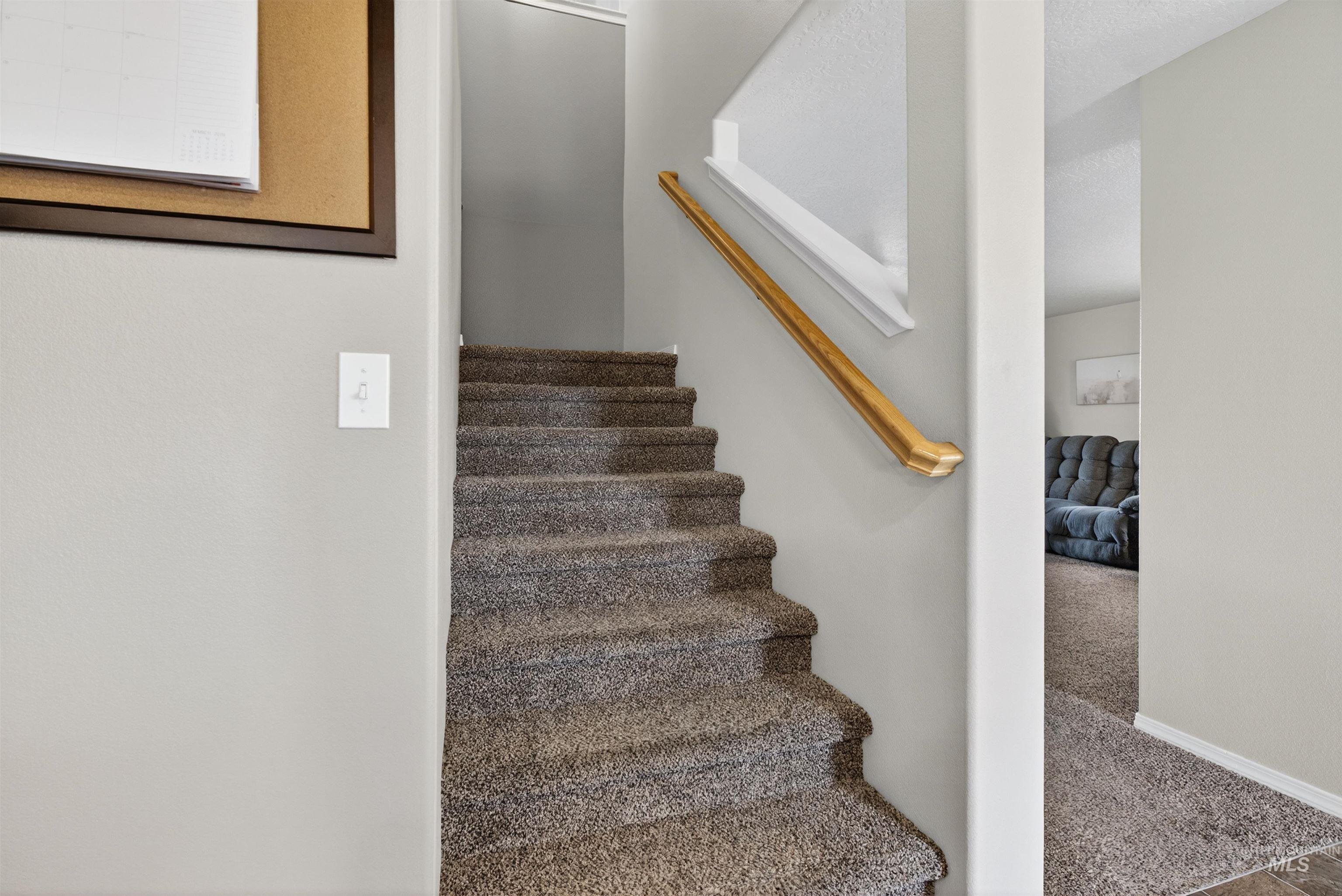5414 Barkley Way Caldwell, ID 83607 - Photo 28 of 50 Stairs featuring carpet flooring and baseboards