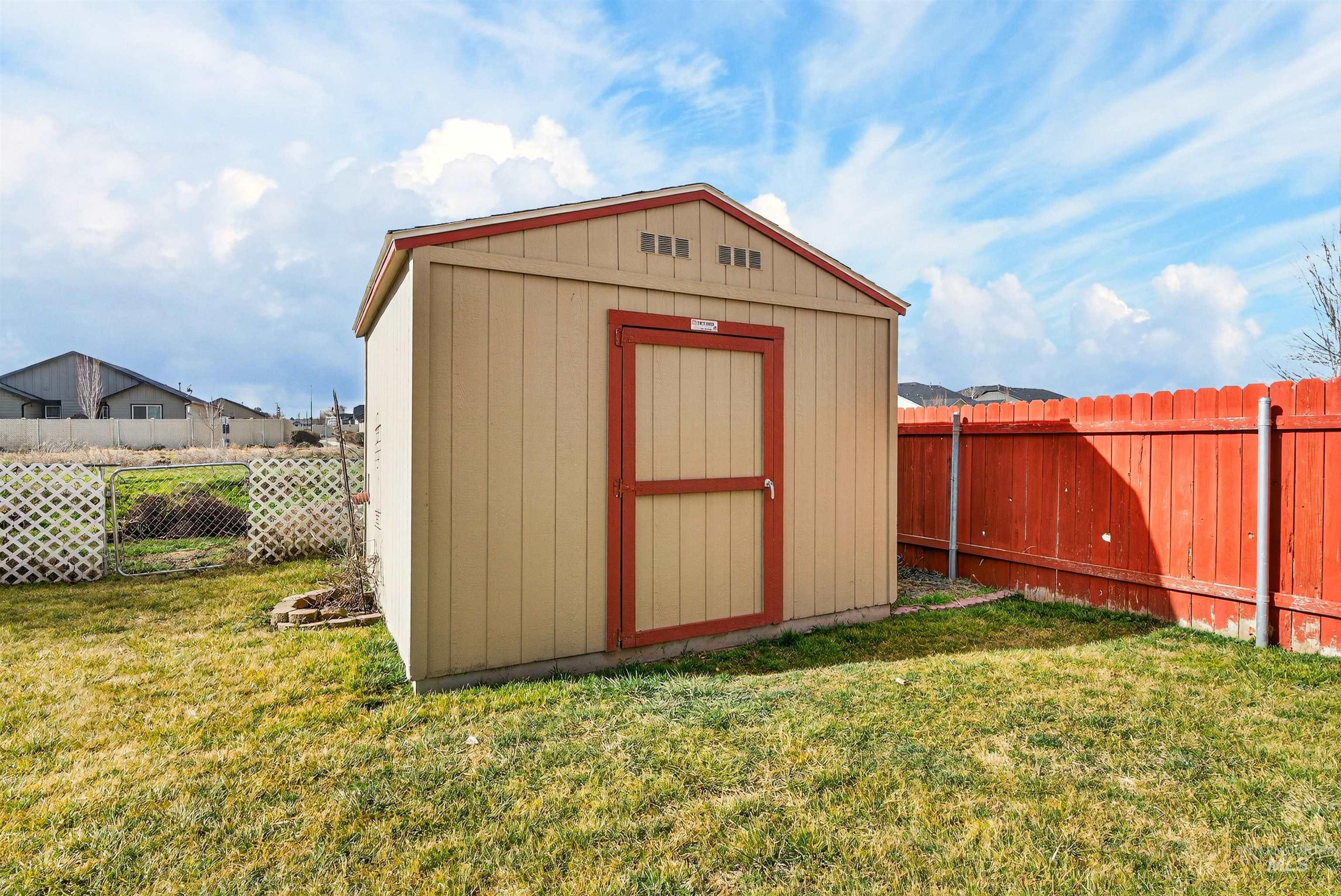 5414 Barkley Way Caldwell, ID 83607 - Photo 31 of 50 View of shed featuring a fenced backyard