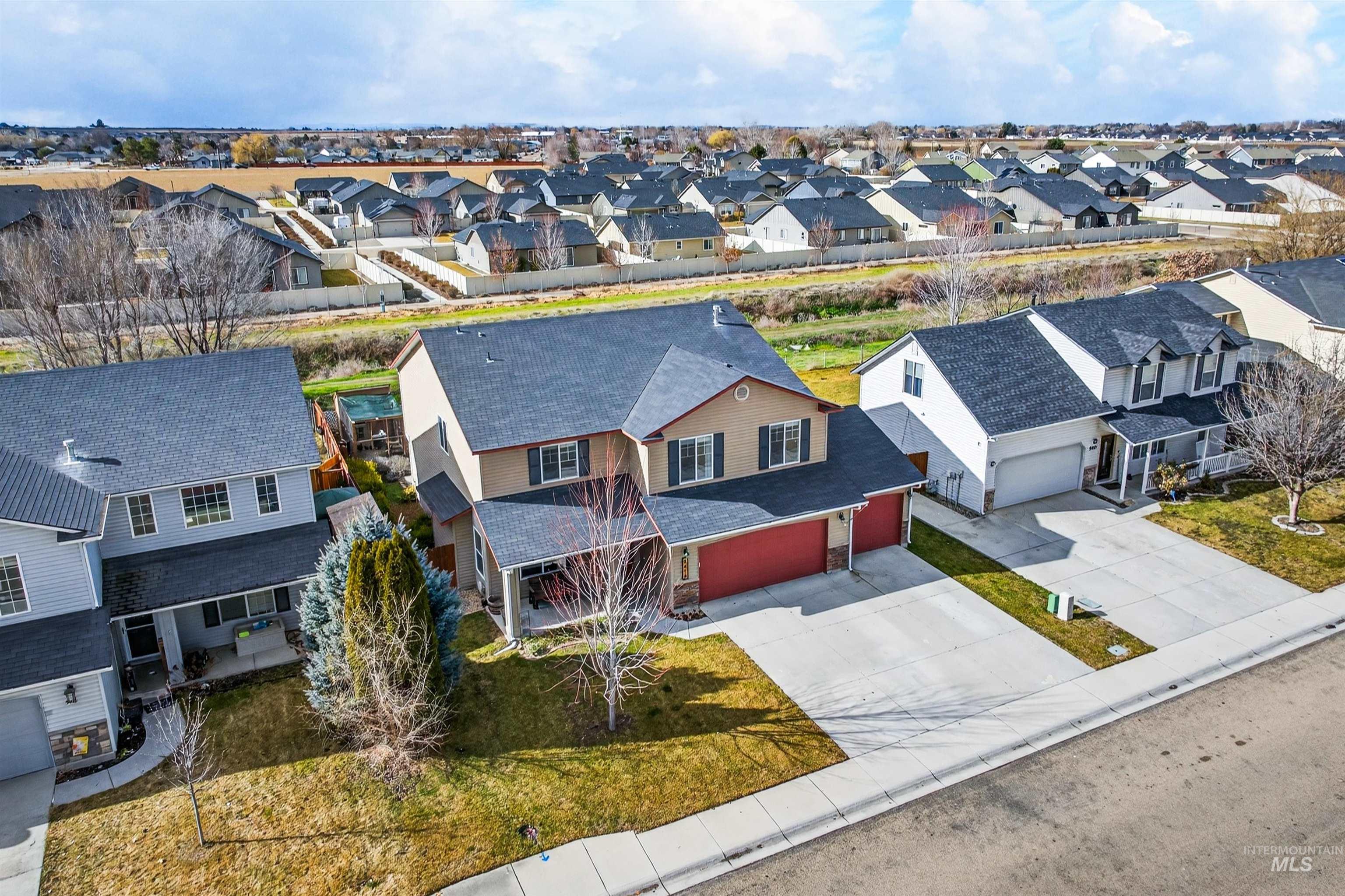 5414 Barkley Way Caldwell, ID 83607 - Photo 41 of 50 Aerial perspective of suburban area
