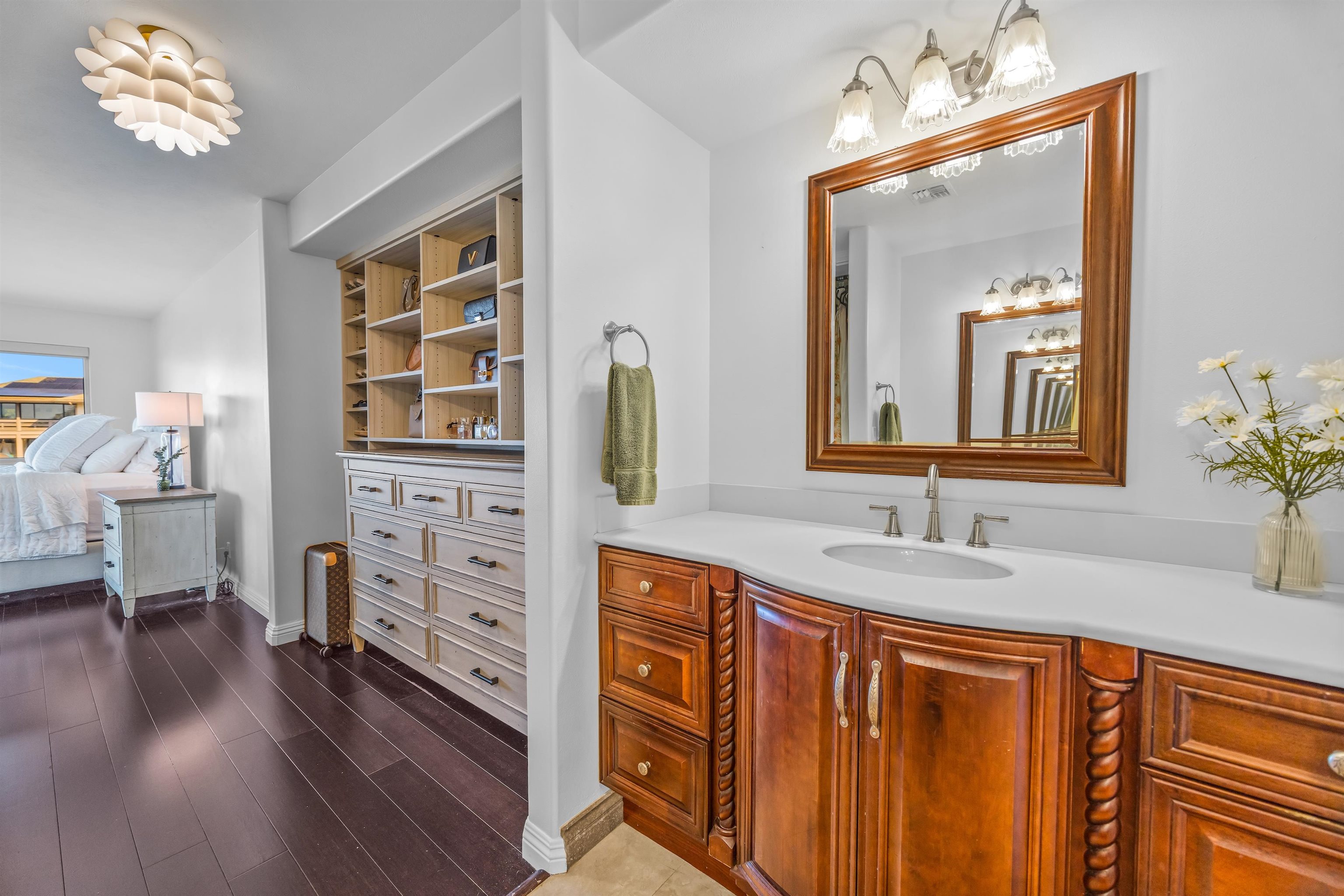 40 Kapalulu Place Kula, HI 96790 - Photo 17 of 45 a bathroom with a sink a vanity and a large mirror