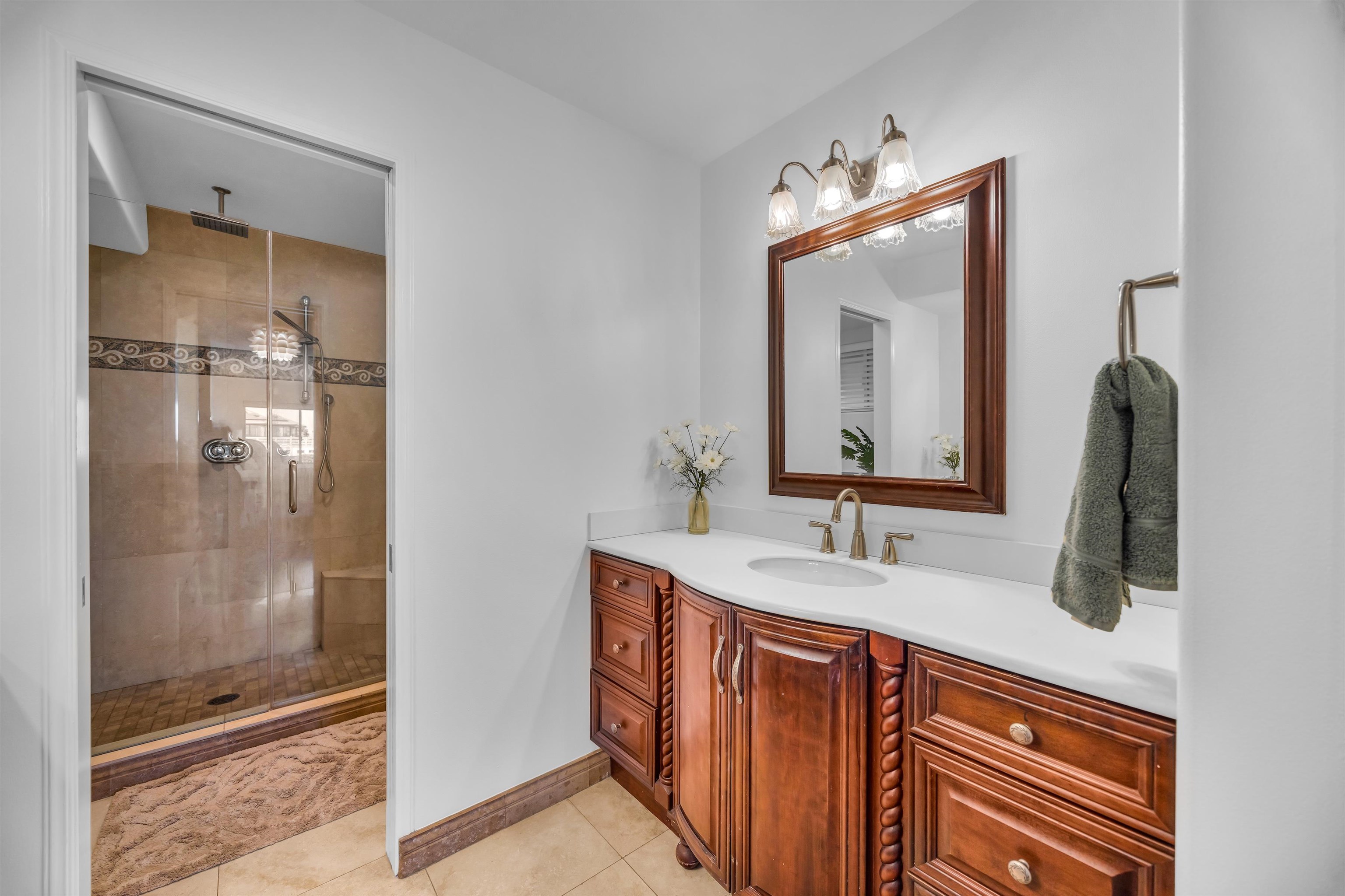 40 Kapalulu Place Kula, HI 96790 - Photo 18 of 45 a bathroom with a sink and a mirror