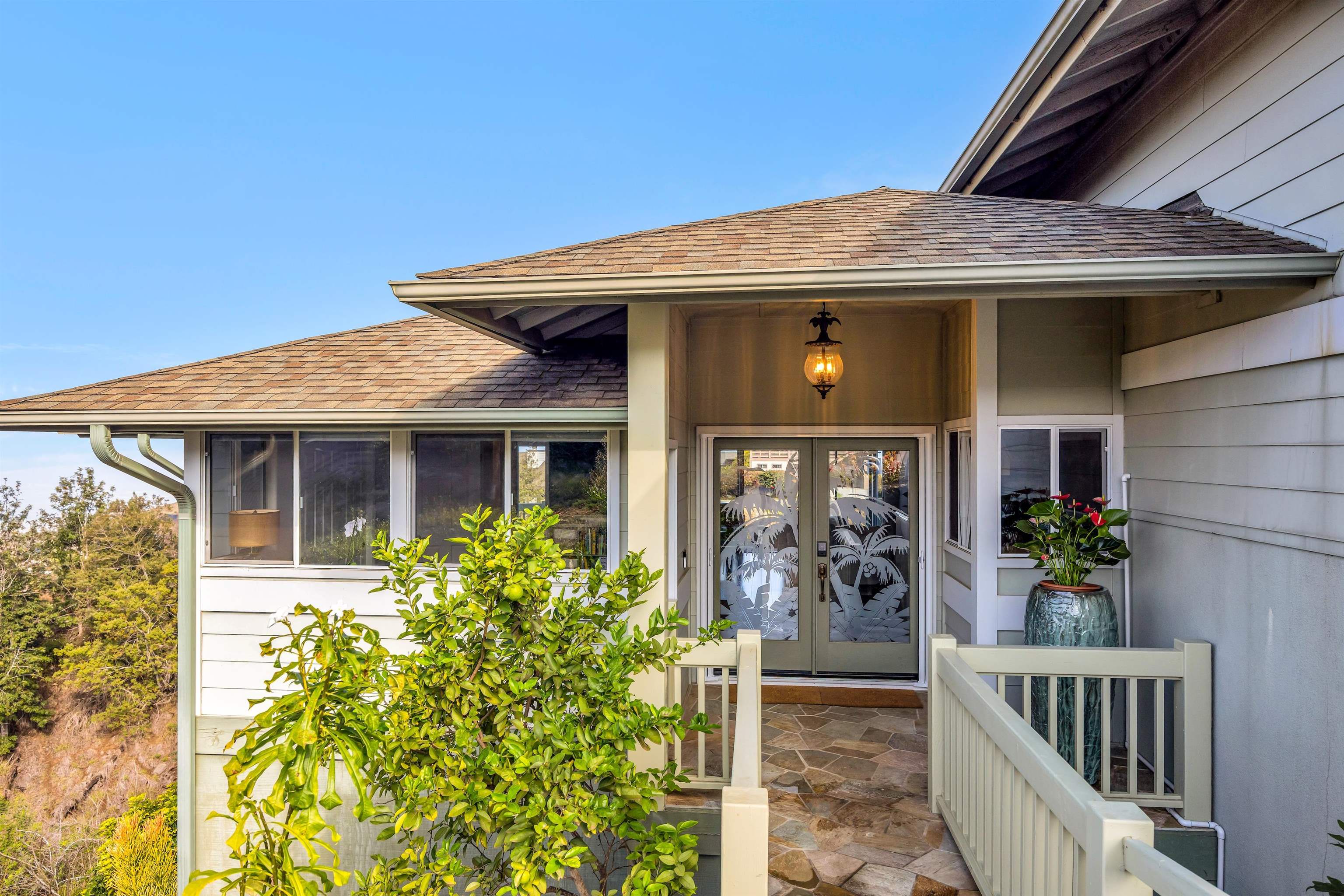 40 Kapalulu Place Kula, HI 96790 - Photo 2 of 45 a front view of a house with garden