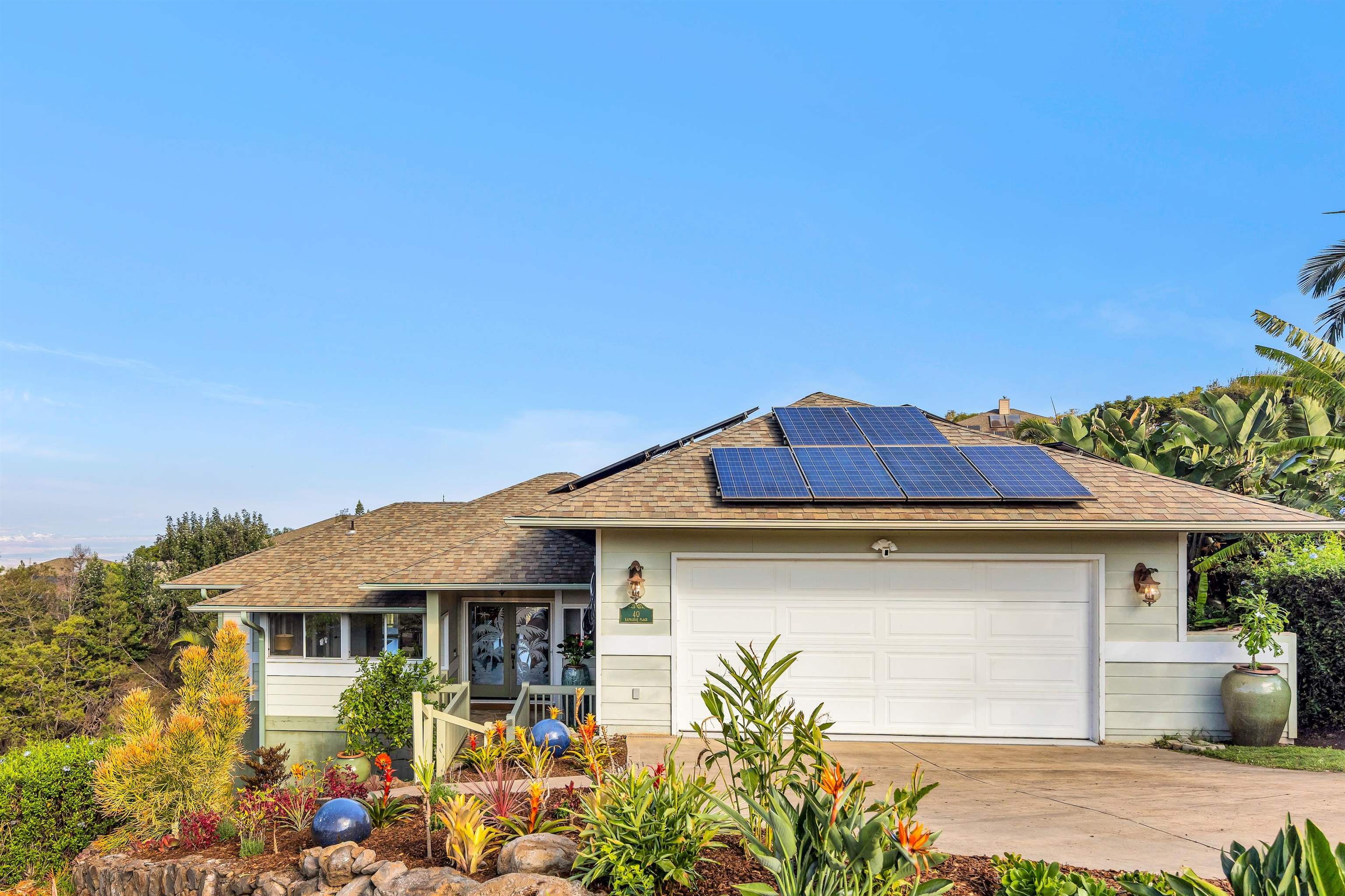 40 Kapalulu Place Kula, HI 96790 - Photo 44 of 45 a front view of a house with garden