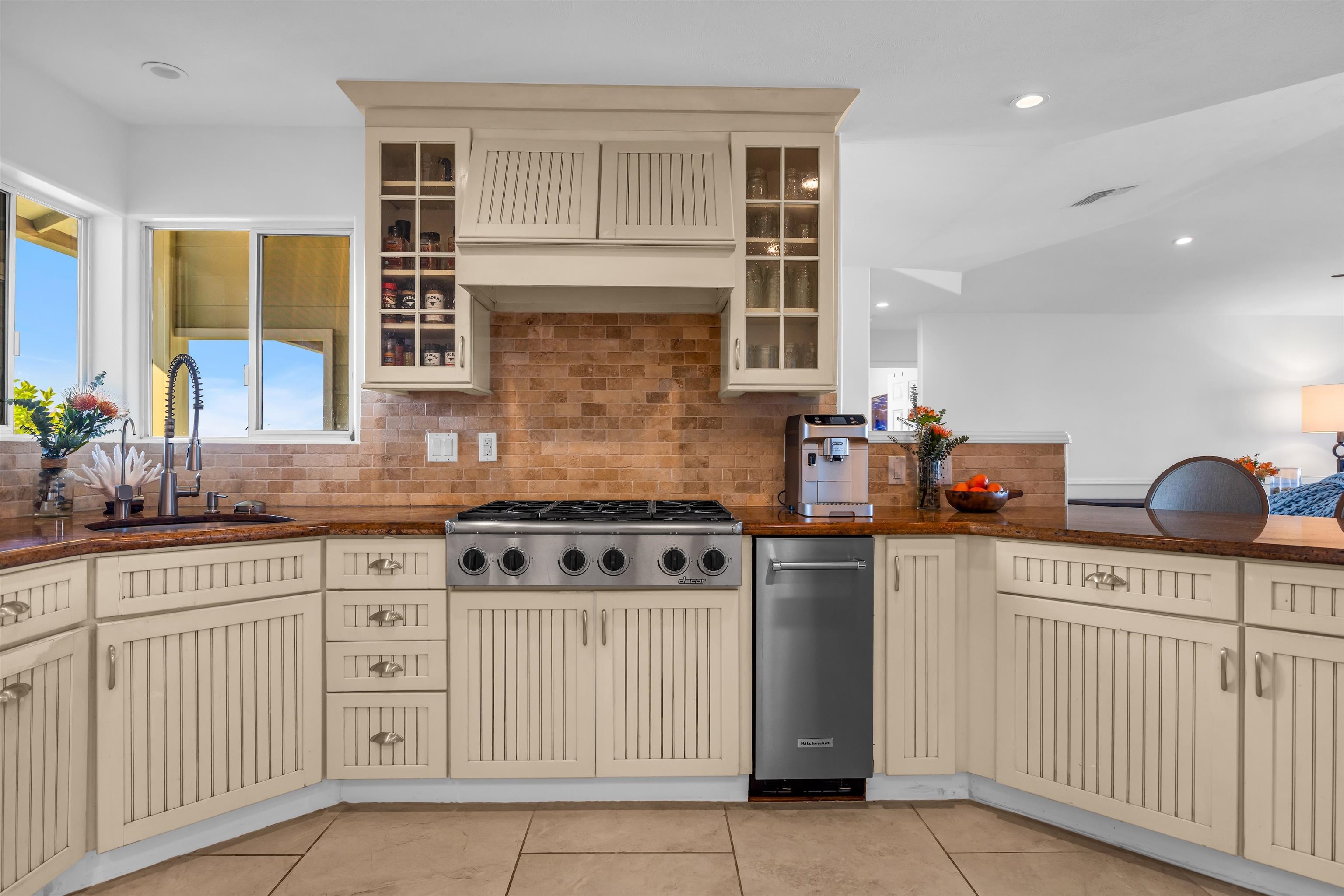 40 Kapalulu Place Kula, HI 96790 - Photo 7 of 45 a kitchen with stainless steel appliances granite countertop a stove a sink and a microwave