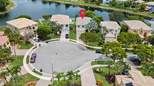 a bedroom with furniture and a book shelf