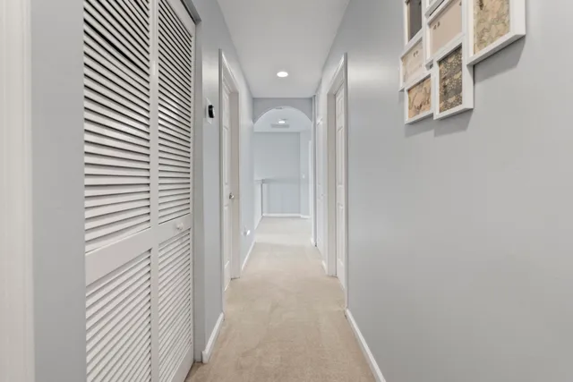 a bed room with a bed and a window