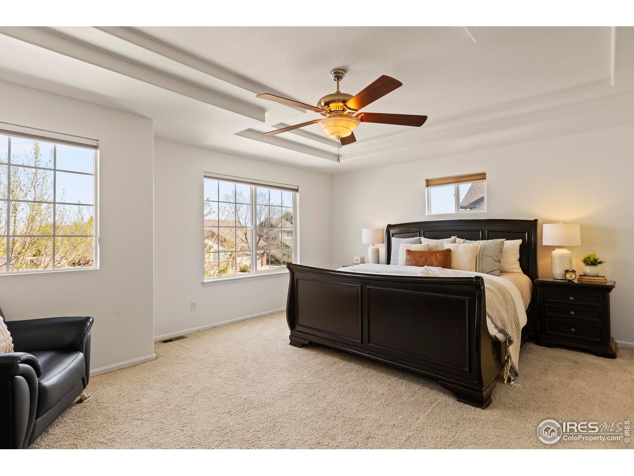 6117 Gold Dust Road Timnath, CO 80547 - Photo 18 of 43 a bed room with a bed and a window