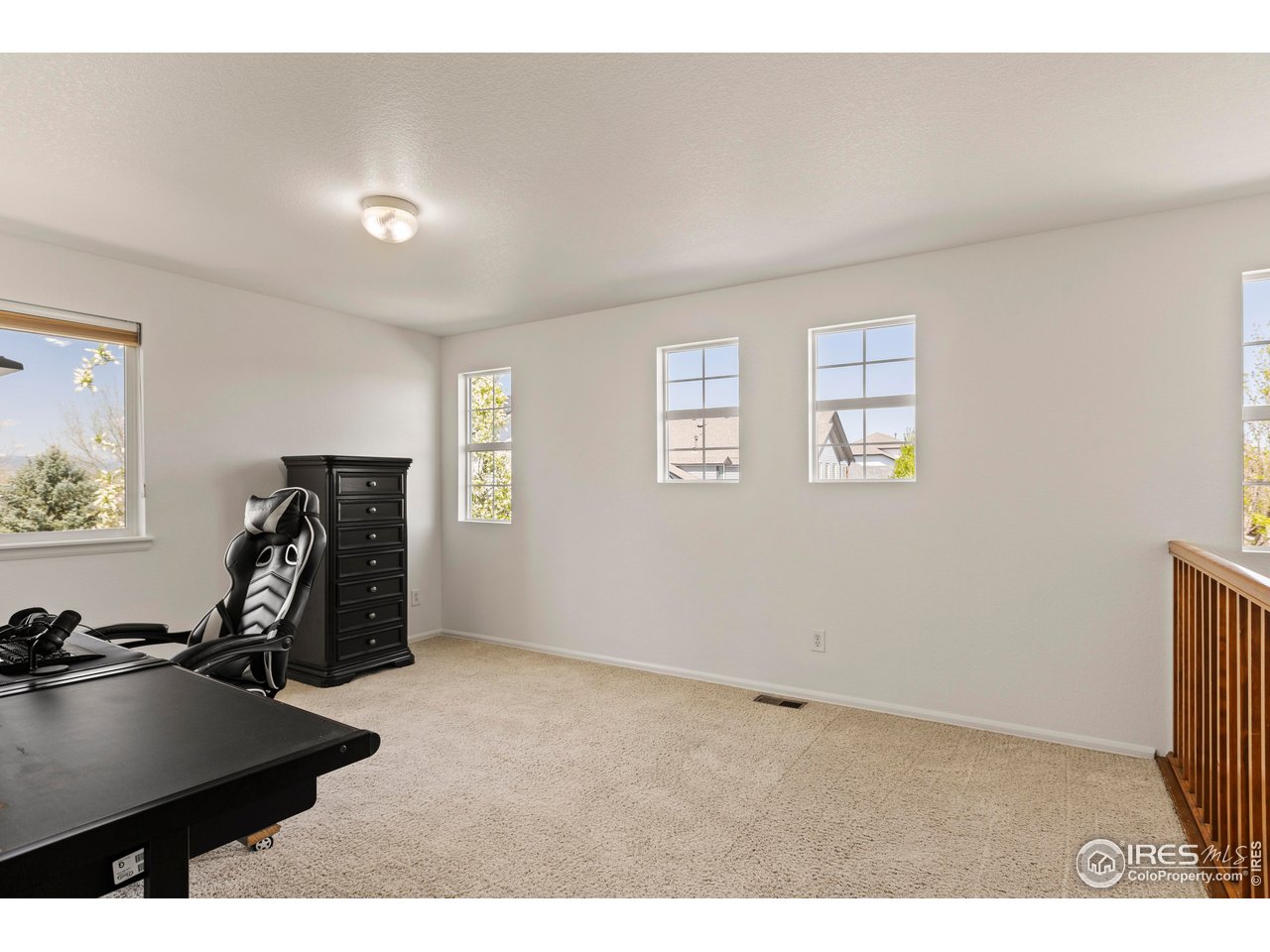 6117 Gold Dust Road Timnath, CO 80547 - Photo 26 of 43 a view of a room with gym equipment