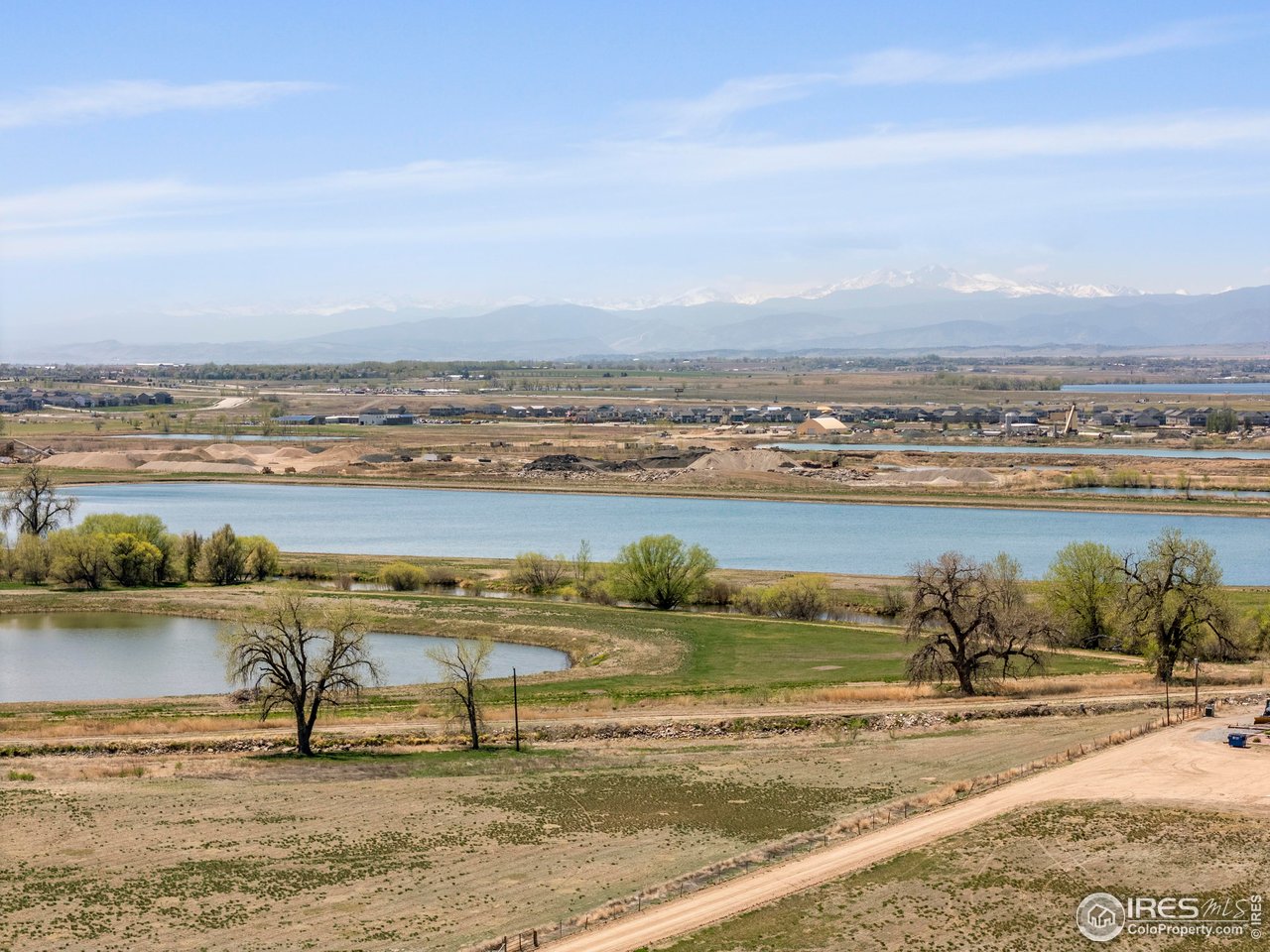 6117 Gold Dust Road Timnath, CO 80547 - Photo 32 of 43 a view of lake view and mountain