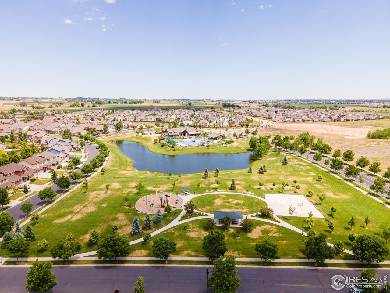 6117 Gold Dust Road Timnath, CO 80547 - Photo 35 of 43 an aerial view of residential building and ocean