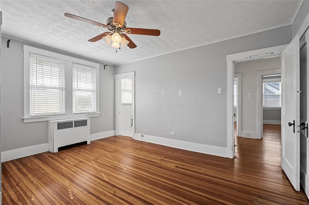 3565 Gerber Avenue Pittsburgh, PA 15212 - Photo 15 of 28 wooden floor in an empty room with a window