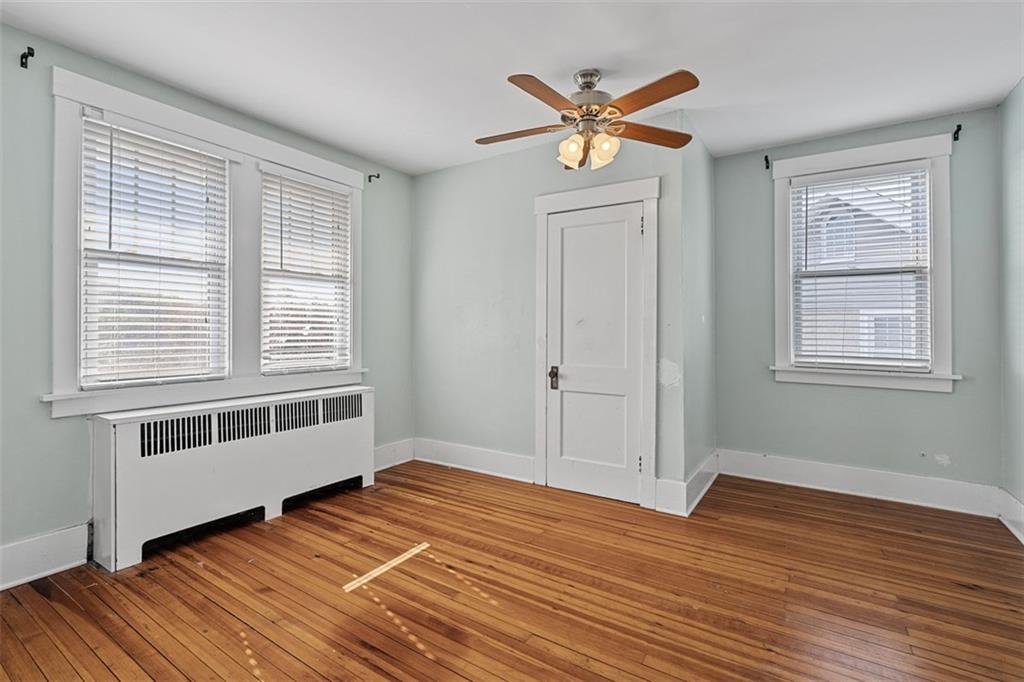 3565 Gerber Avenue Pittsburgh, PA 15212 - Photo 19 of 28 a view of a livingroom with wooden floor and a window