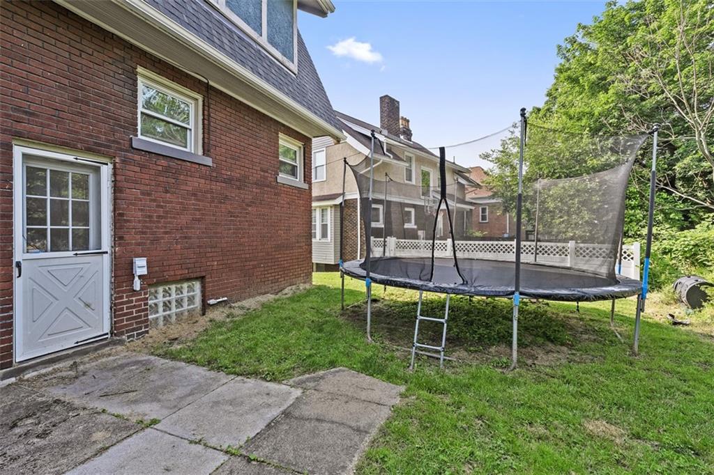 3565 Gerber Avenue Pittsburgh, PA 15212 - Photo 24 of 28 a view of a chair and table in backyard of the house