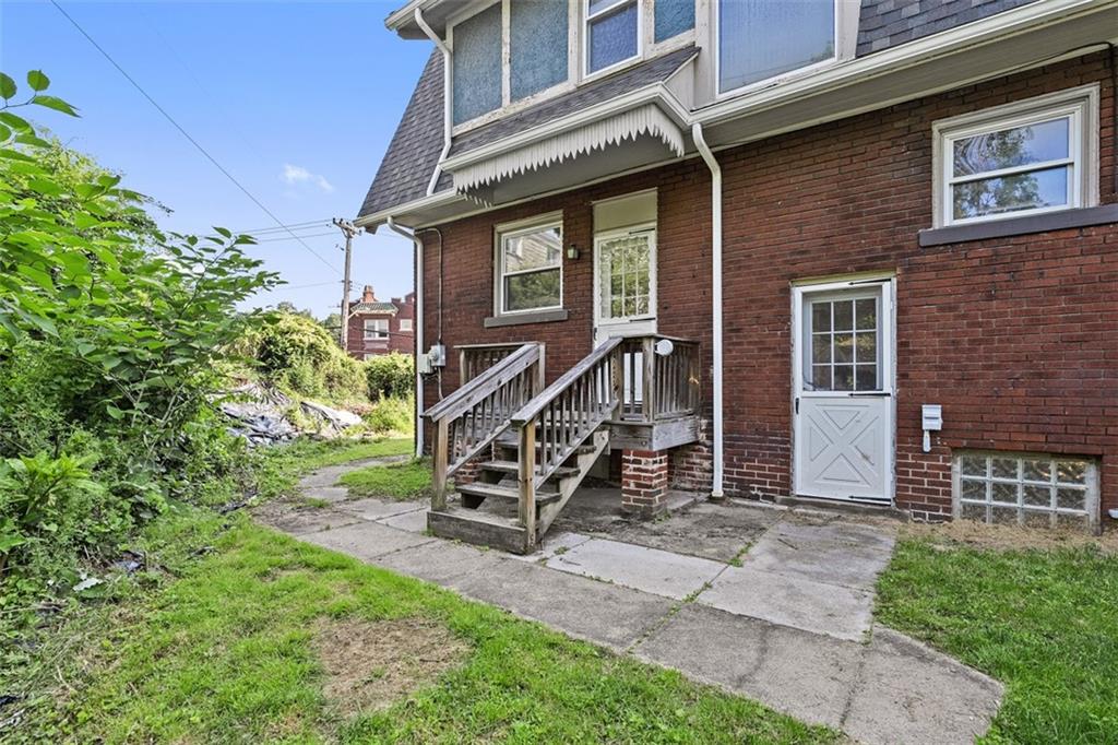 3565 Gerber Avenue Pittsburgh, PA 15212 - Photo 25 of 28 a front view of a house with a yard