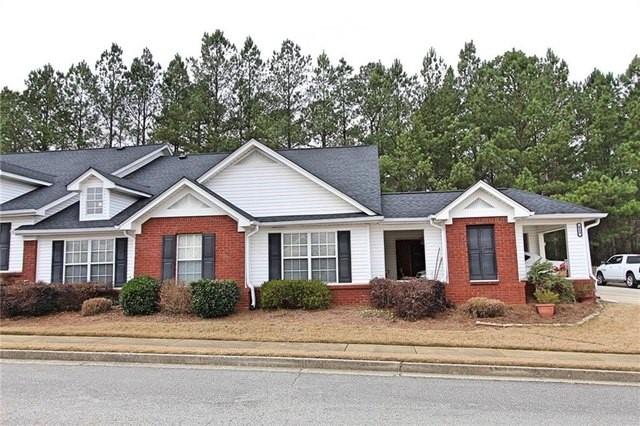 150 Old Mill Road, Unit 102 Cartersville, GA 30120 - Photo 1 of 1 front view of a house next to a yard