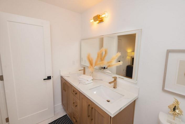 1495 Ancon Street Seaside, CA 93955 - Photo 19 of 35 a bathroom with a sink a mirror and a vanity
