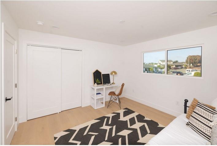 1495 Ancon Street Seaside, CA 93955 - Photo 25 of 35 a work room with a black white checkered floor with a black white checkered floor