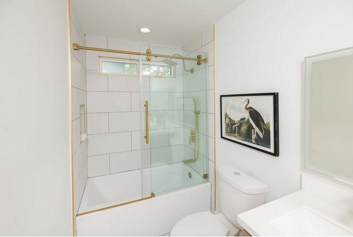 1495 Ancon Street Seaside, CA 93955 - Photo 26 of 35 a bathroom with a shower a toilet and a bathtub