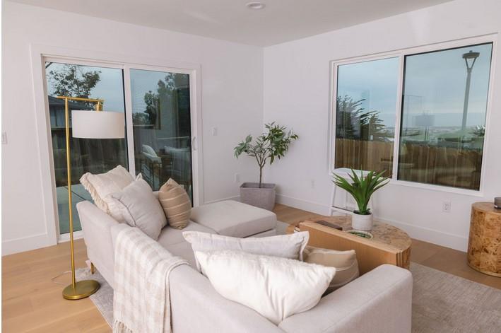 1495 Ancon Street Seaside, CA 93955 - Photo 28 of 35 a living room with furniture and a potted plant