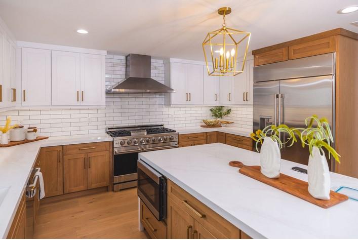 1495 Ancon Street Seaside, CA 93955 - Photo 4 of 35 a kitchen with a stove a sink and a refrigerator