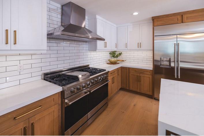 1495 Ancon Street Seaside, CA 93955 - Photo 8 of 35 a kitchen with stainless steel appliances a stove a sink and a refrigerator