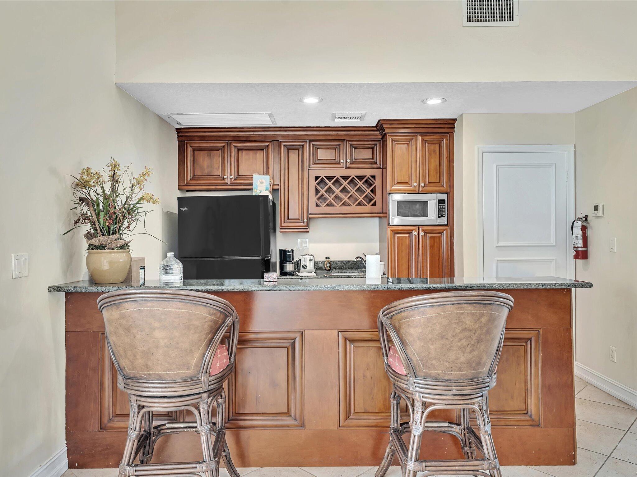 6284 La Costa Drive, Unit K Boca Raton, FL 33433 - Photo 47 of 57 Clubhouse Kitchen