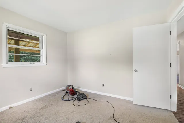 an empty room with a window