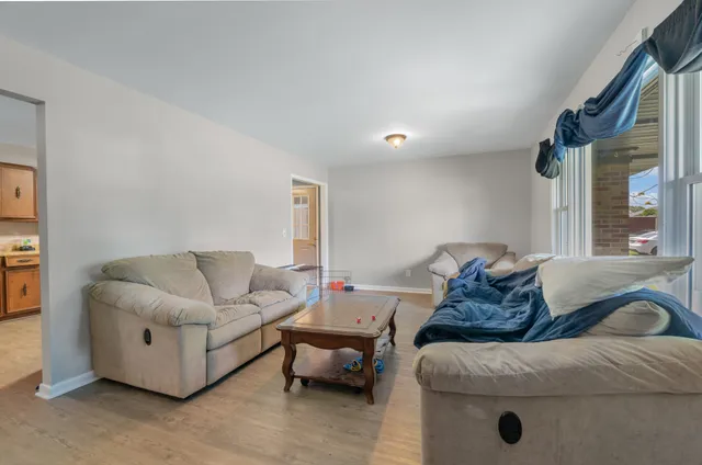 a living room with furniture and a couch