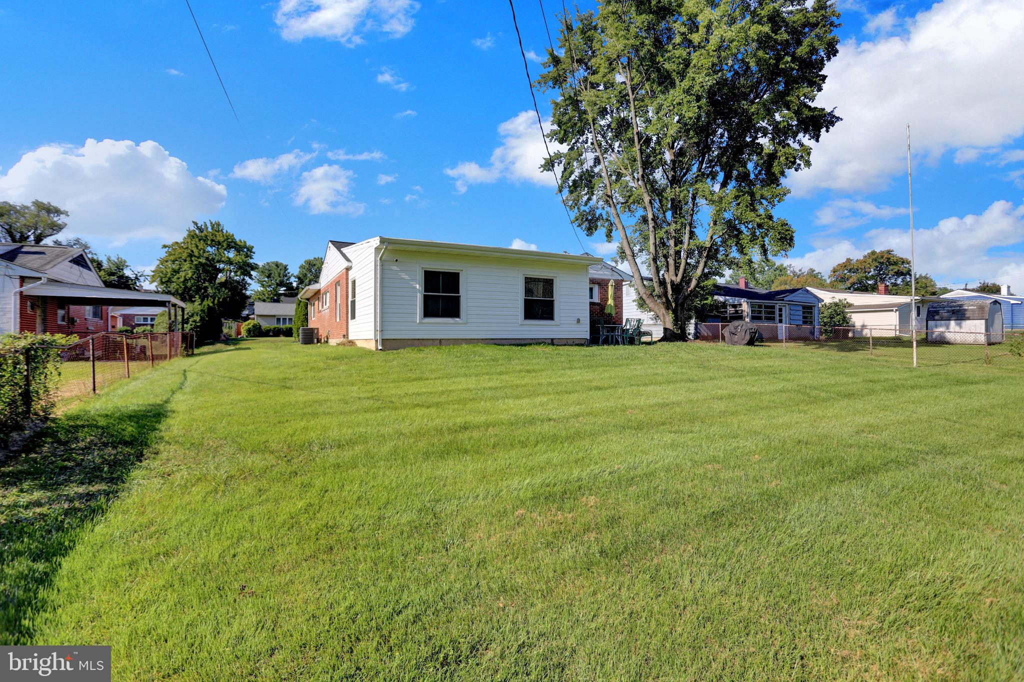 2608 Burridge Road Parkville, MD 21234 - Photo 13 of 15 a view of a house with a yard