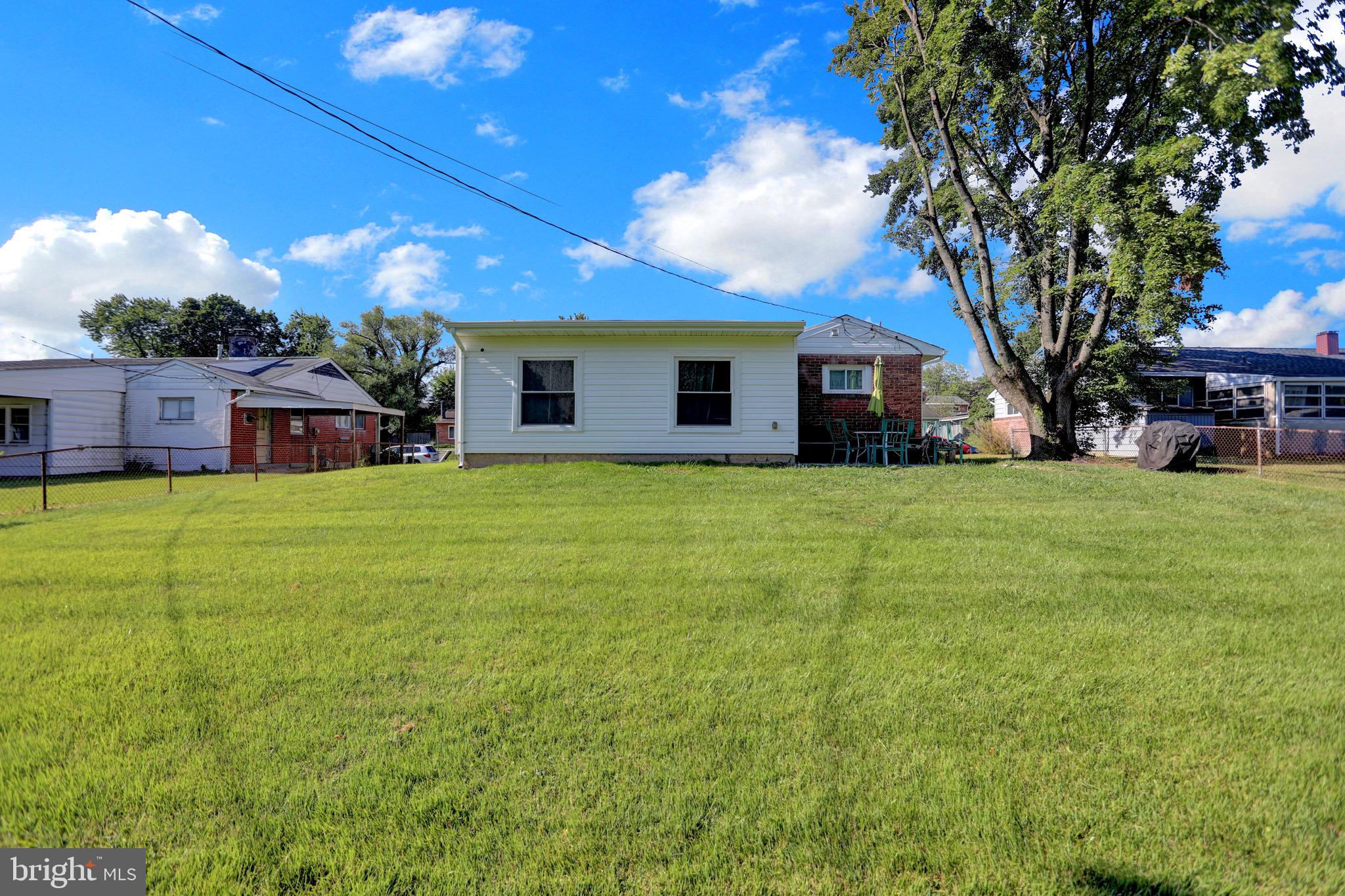 2608 Burridge Road Parkville, MD 21234 - Photo 14 of 15 a view of a house with a yard