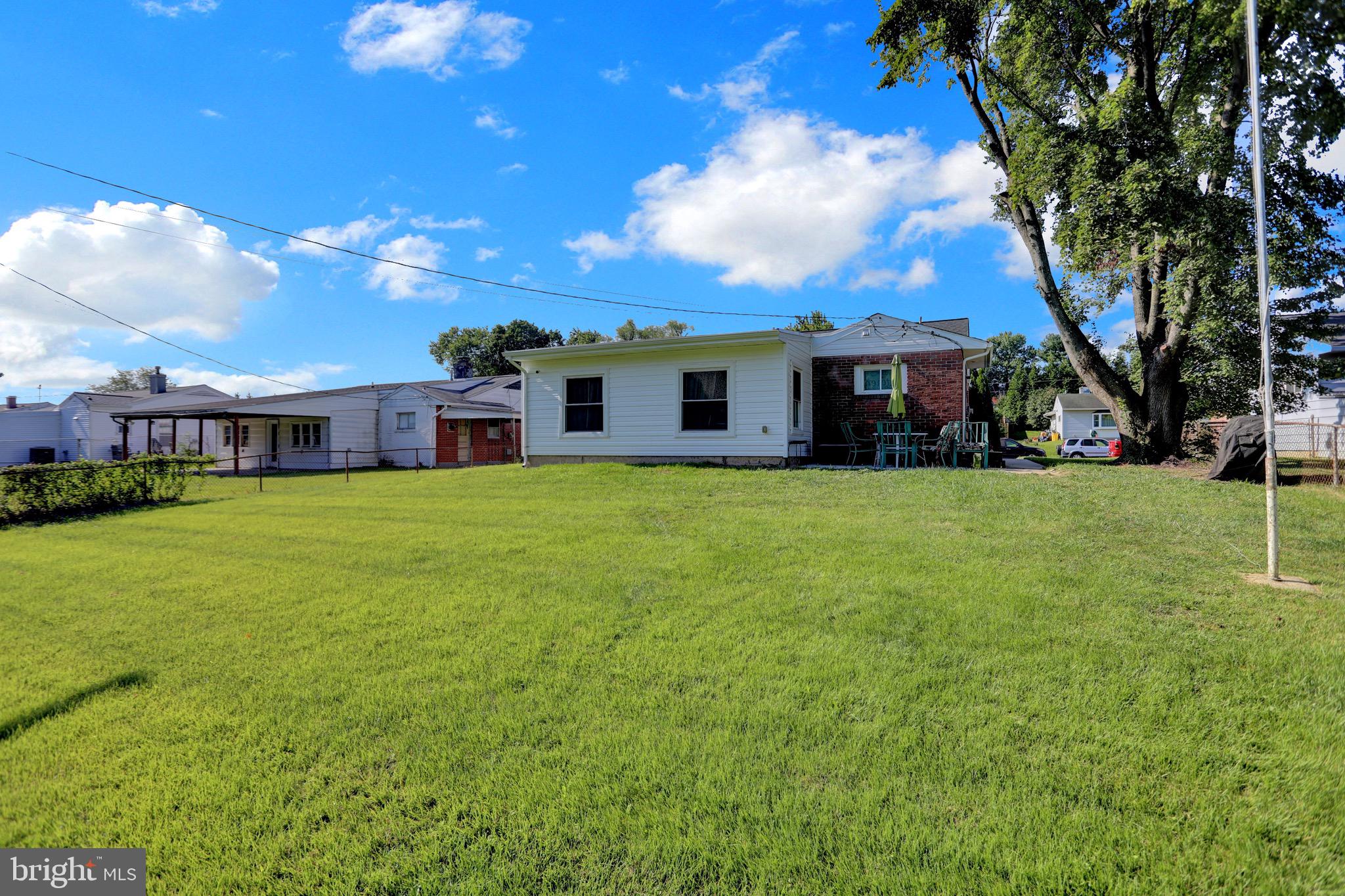 2608 Burridge Road Parkville, MD 21234 - Photo 15 of 15 a view of a house with a yard