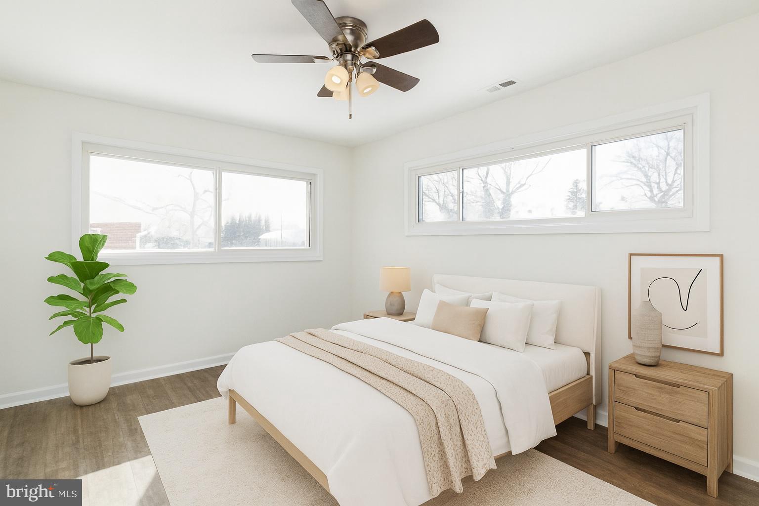 2608 Burridge Road Parkville, MD 21234 - Photo 4 of 15 a bedroom with a bed plant and a window